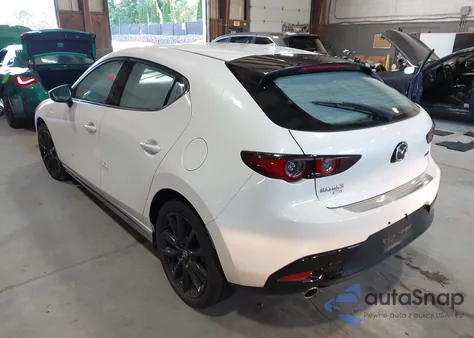 2021 Mazda Mazda3 Hatchback Premium from USA, damaged, VIN JM1BPBML6M1348258